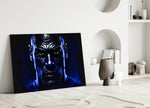 Iconic Michael Jordan close-up showing bowed head with cobalt rim-light