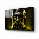 Iconic Michael Jordan glass wall art displayed above a leather sofa in a moody man cave with brass sconces