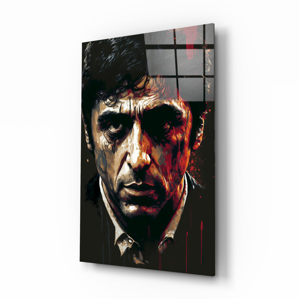 Al Pacino glass wall art displayed above a leather chesterfield in a moody man cave with brass sconces