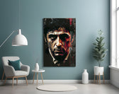 Al Pacino glass wall art styled above a console in a study