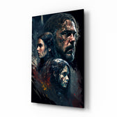 Game of Thrones glass wall art displayed above a leather sofa in a moody man cave with brass sconces