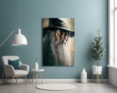 Gandalf glass wall art styled above a leather chesterfield in a library