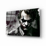 Joker glass wall art displayed above a leather sofa in a moody man cave with brass sconces