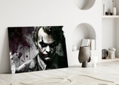 Joker close-up showing tilted face with crimson smile and plum splatters