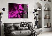 Joker glass wall art styled above a console in a teen lounge