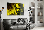 Joker glass wall art styled above a console in a teen lounge