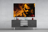Joker panel catching lamp light to reveal its smoldering gravity