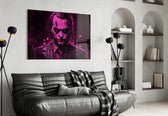 Joker glass wall art styled above a console in a teen lounge