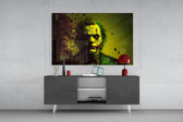 Joker panel catching lamp light to reveal its toxic gravitas