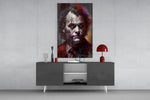 Joker panel catching lamp light to reveal its kinetic gravity
