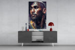 Kobe Bryant panel catching lamp light to reveal its solemn gravity