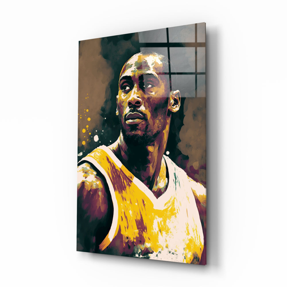 Kobe Bryant glass wall art displayed above a leather sofa in a moody man cave with brass sconces