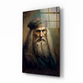 Leonardo da Vinci glass wall art displayed above a walnut desk in a moody study with brass sconces
