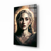 Madonna glass wall art displayed above a low dresser in a serene master bedroom with cream linens