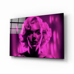 Marilyn Monroe glass wall art displayed above a vanity in a neon-glam dressing room