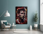 Messi glass wall art styled above a console in a sports lounge