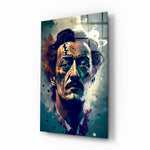 Salvador Dali glass wall art displayed above a writing desk in a literary study
