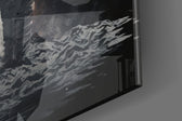 Lone spaceman artwork anchoring a wall with onyx-and-ember palette