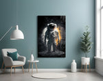 Astronaut glass wall art styled above a console in a sci-fi study