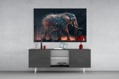 Elephant panel catching lamp light to reveal its totem-walker hush