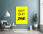 Get Shit Done glass wall art styled above a console in a creative studio