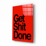 Get Shit Done glass wall art displayed above a desk in a contemporary home office