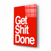 Get Shit Done glass wall art displayed above a desk in a contemporary home office