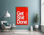 Get Shit Done glass wall art styled above a console in a startup lounge
