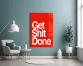 Get Shit Done glass wall art styled above a console in a startup lounge