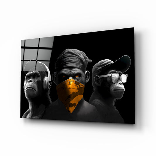 3 Wise Monkeys glass wall art displayed above a leather sofa in a man cave with collector pulse