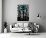 Women close-up showing teal braided headwrap, teal lips and teardrop earrings