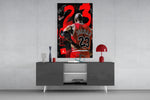 Jordan panel catching lamp light to reveal its street-poster collage
