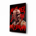 Michael Jordan glass wall art displayed above a leather sofa in a man cave with championship pulse
