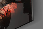 Renaissance artwork anchoring a wall with crimson-and-onyx palette
