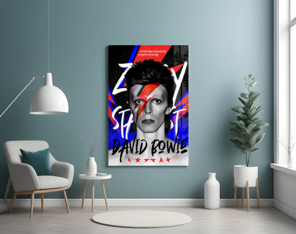 David Bowie glass wall art styled above a console in a games corner