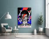 David Bowie glass wall art styled above a console in a games corner