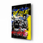 Andy Warhol vs Basquiat glass wall art displayed above a workbench in a creative studio