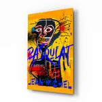Basquiat-style glass wall art displayed above a workbench in a creative studio
