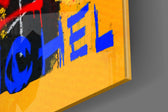 Skull-crown artwork anchoring a wall with saffron-and-cobalt palette