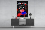 Basquiat-style panel catching lamp light to reveal its street defiance