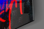 Masked-icon artwork anchoring a wall with scarlet-and-cobalt palette