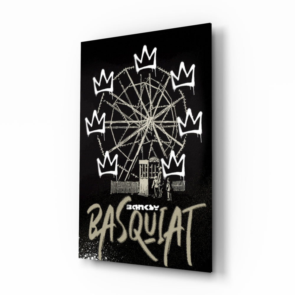 Banksy Basquiat glass wall art displayed above a workbench in a creative studio
