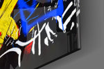 Raised-hand artwork anchoring a wall with sapphire-and-saffron palette