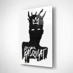 Basquiat-style glass wall art displayed above a workbench in a creative studio
