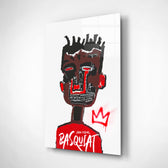Basquiat-style glass wall art displayed above a workbench in a creative studio