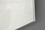 Typographic artwork anchoring a desk wall with scarlet-and-cream palette