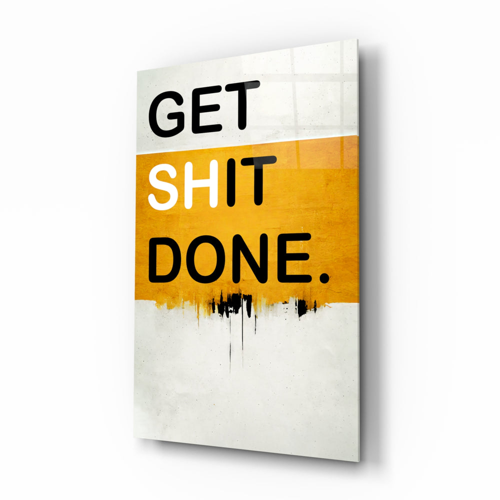 Get Shit Done glass wall art displayed above a desk in a contemporary home office