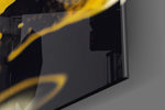Marbled-pour artwork anchoring a wall with onyx-and-gold palette