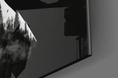 Inner-landscape artwork anchoring a wall with greyscale-and-cloud palette