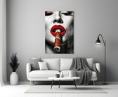 Cuban close-up showing crimson lips around a banded cigar
